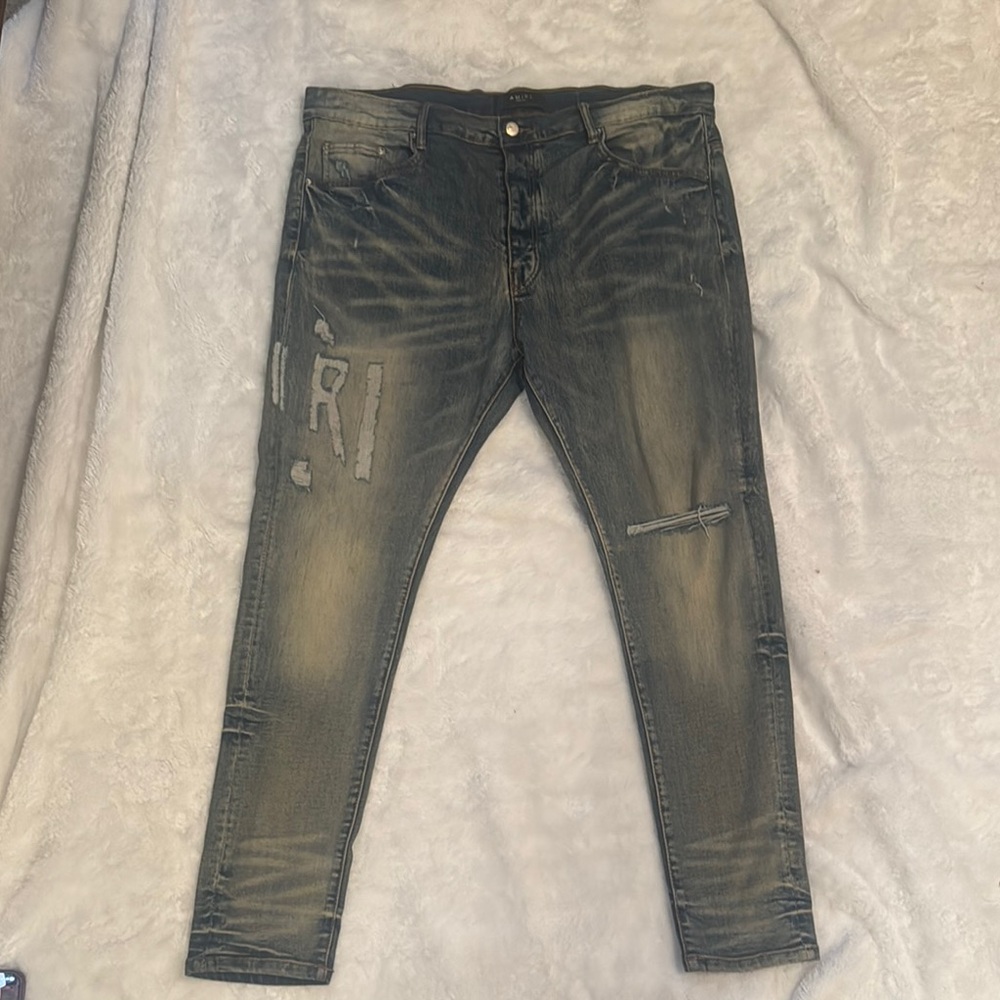 AMIRI Black Skinny Jeans with Vintage Appeal